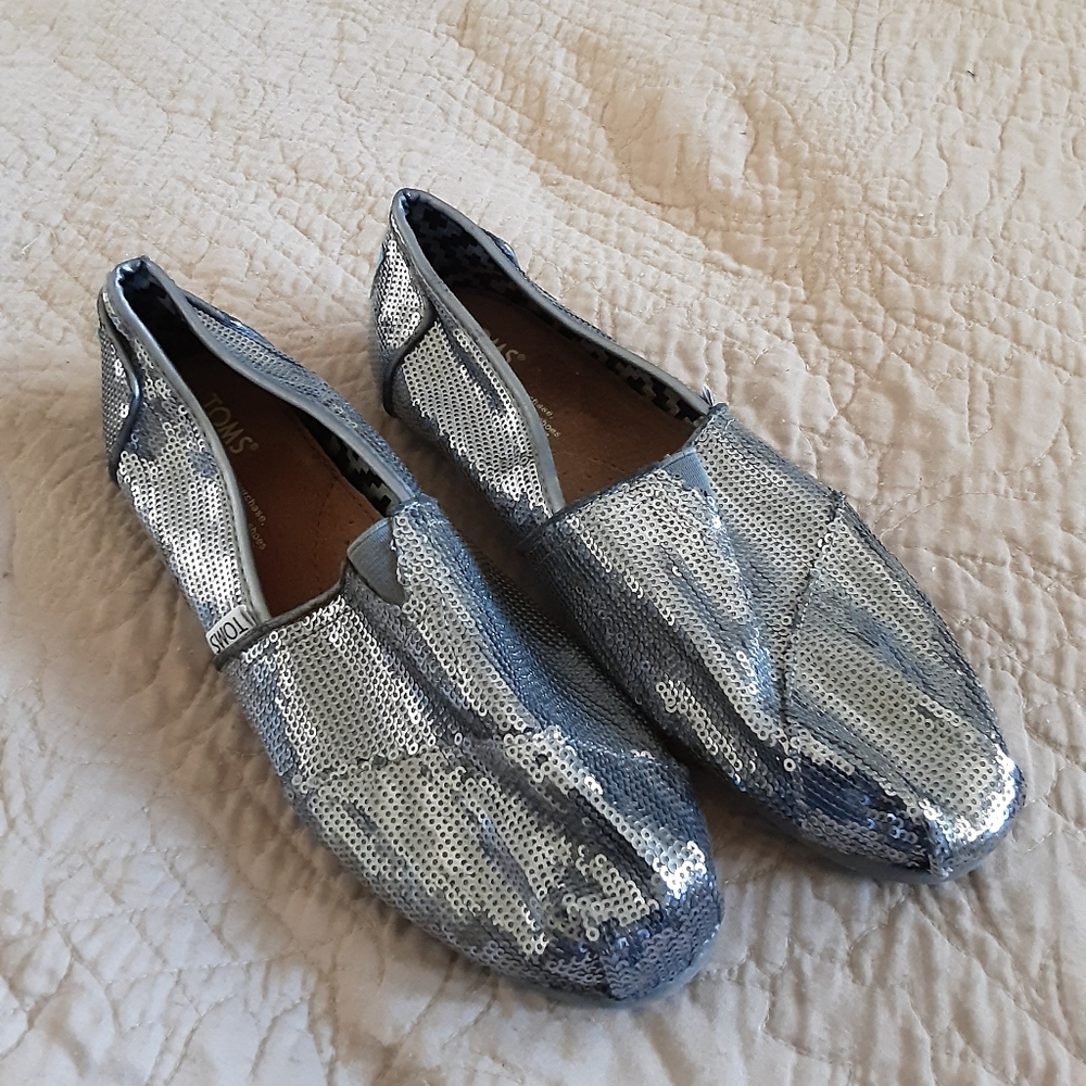 TOMS silver sequin slip on flats.